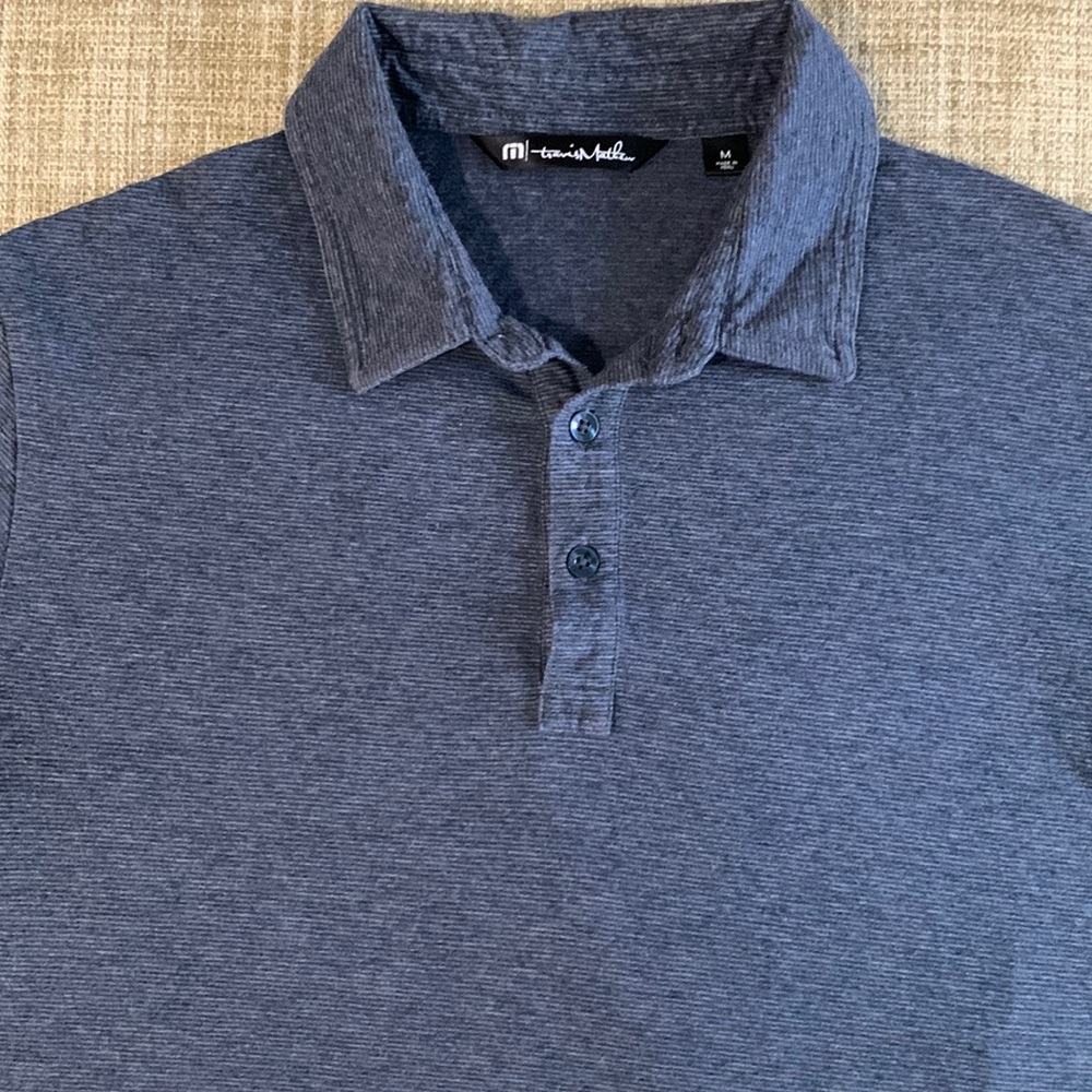 Travis Mathew short sleeve polo. Mens size medium. Grey and dark blue